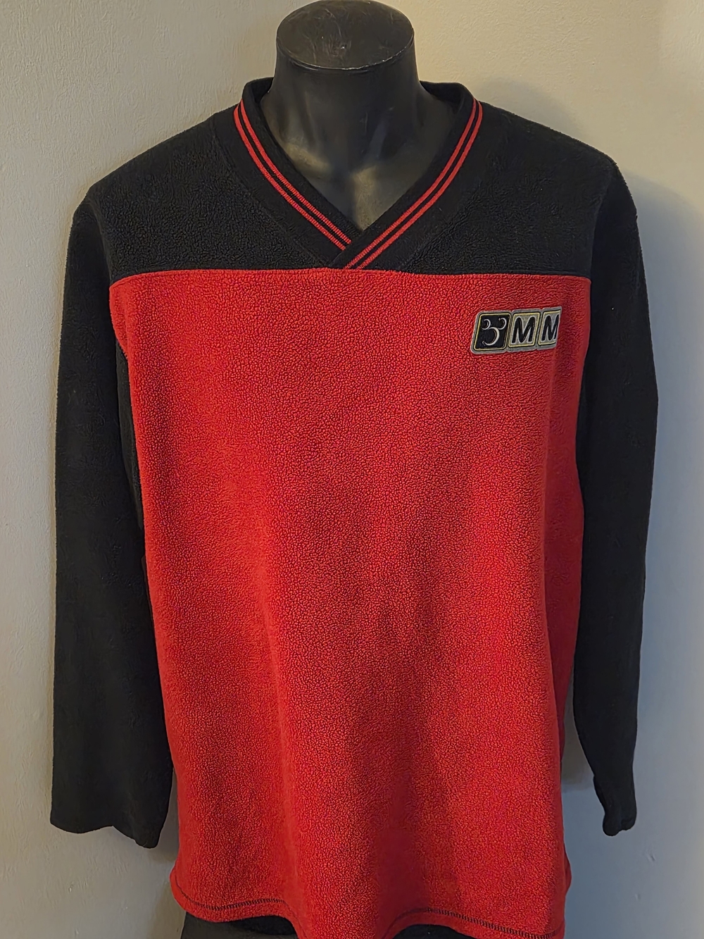 Disney Mickey Mouse Men’s Red and Black V-Neck Colorblock Sweater